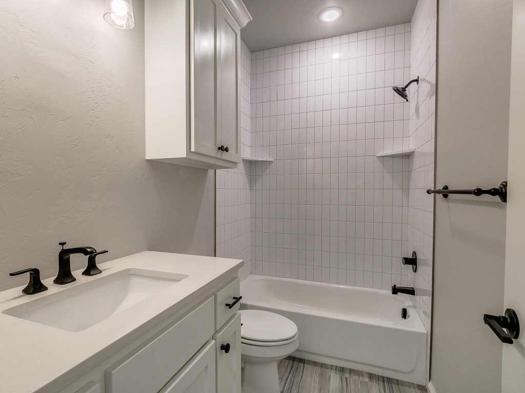 Bathroom with sink, bathtub, and toilet